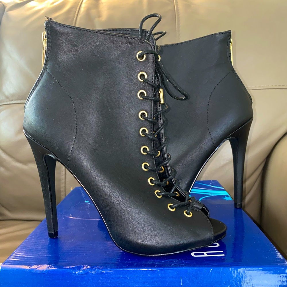 Woman’s black heels.